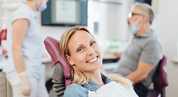 Woman smiling in the dental chair