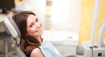 Smiling woman in dental chair