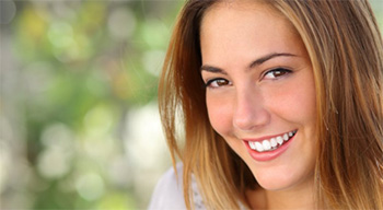 A woman smiling.