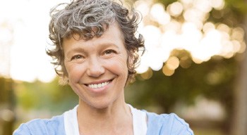 closeup of woman smiling outside