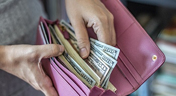 Wallet of money for dentures in Somerville