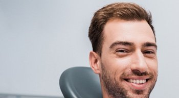 Man giving thumbs up after dental implant salvage in Somerville, NJ