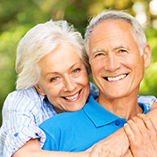 man and woman hugging