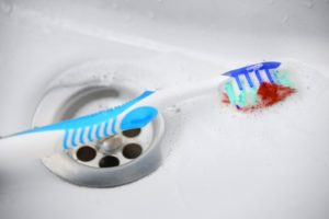 a toothbrush with blood on it