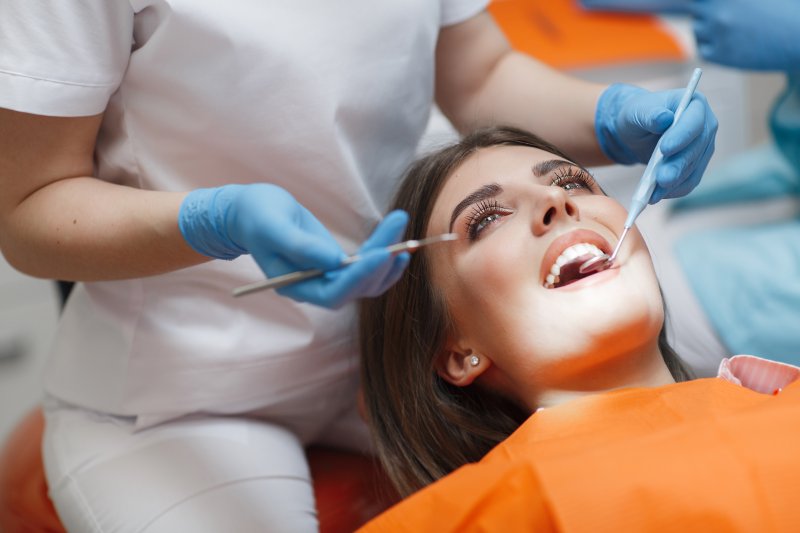 Woman smiling during dental checkup