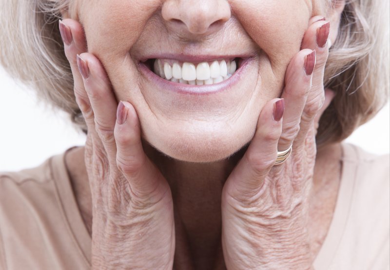 woman with ill-fitting dentures in Somerville